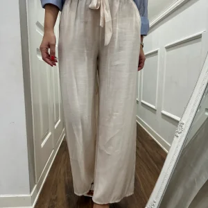 PANTALONE CON FIOCCO PANNA