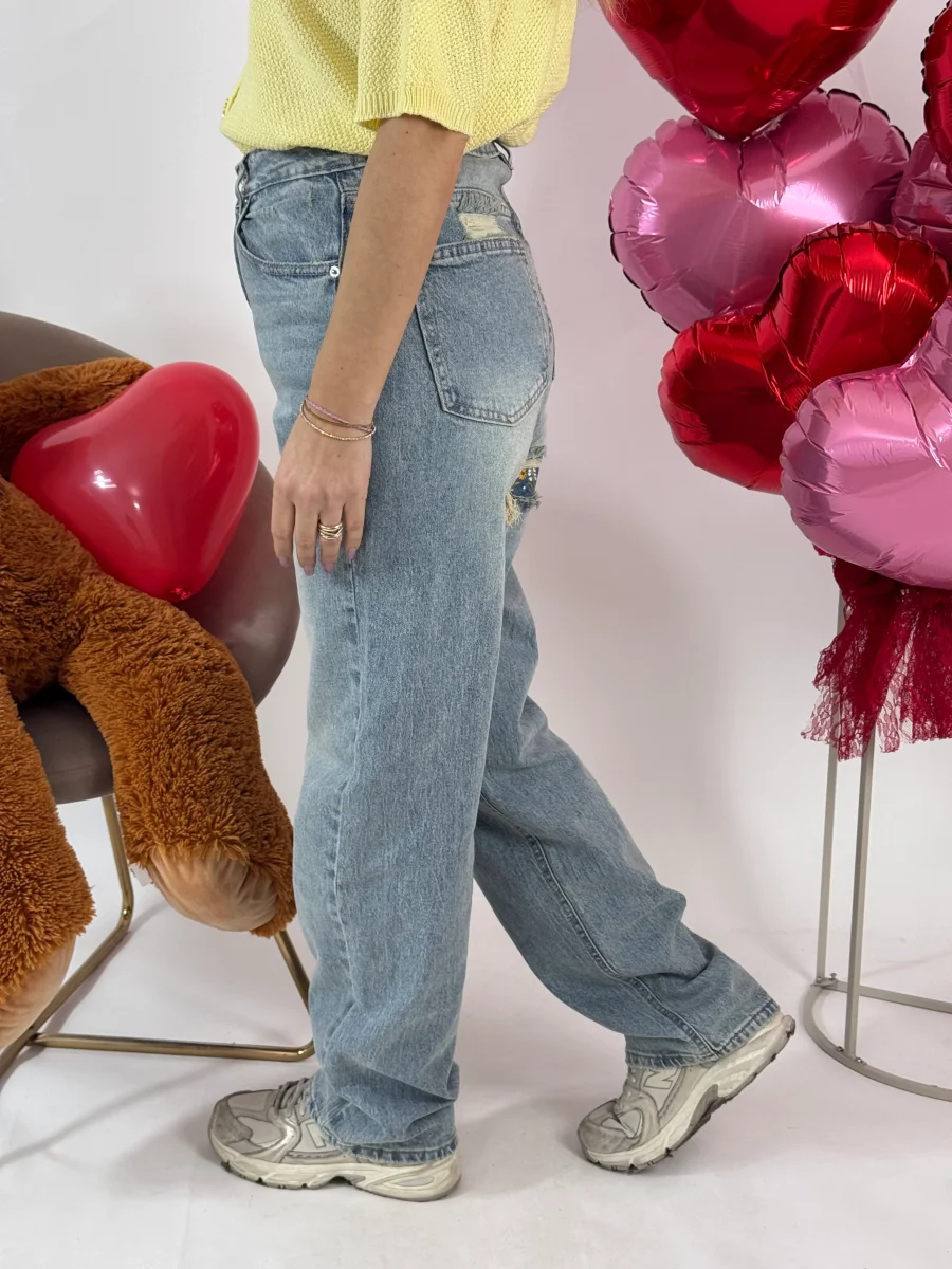 JEANS STRAPPO CON FIORI - immagine 6