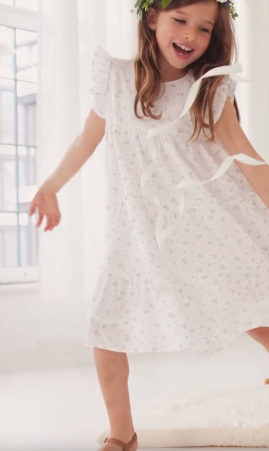 Abito da cerimonia bianco con fiori - immagine 3