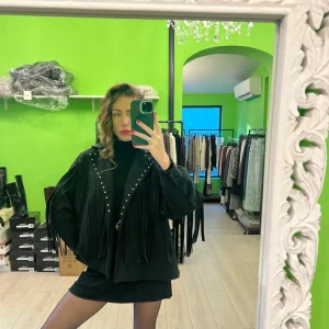 Giacca con frange e borchie